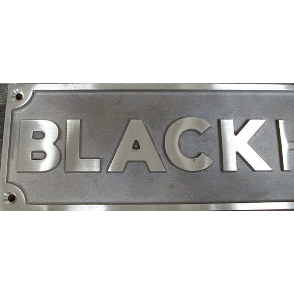 Cast bronze panel of names